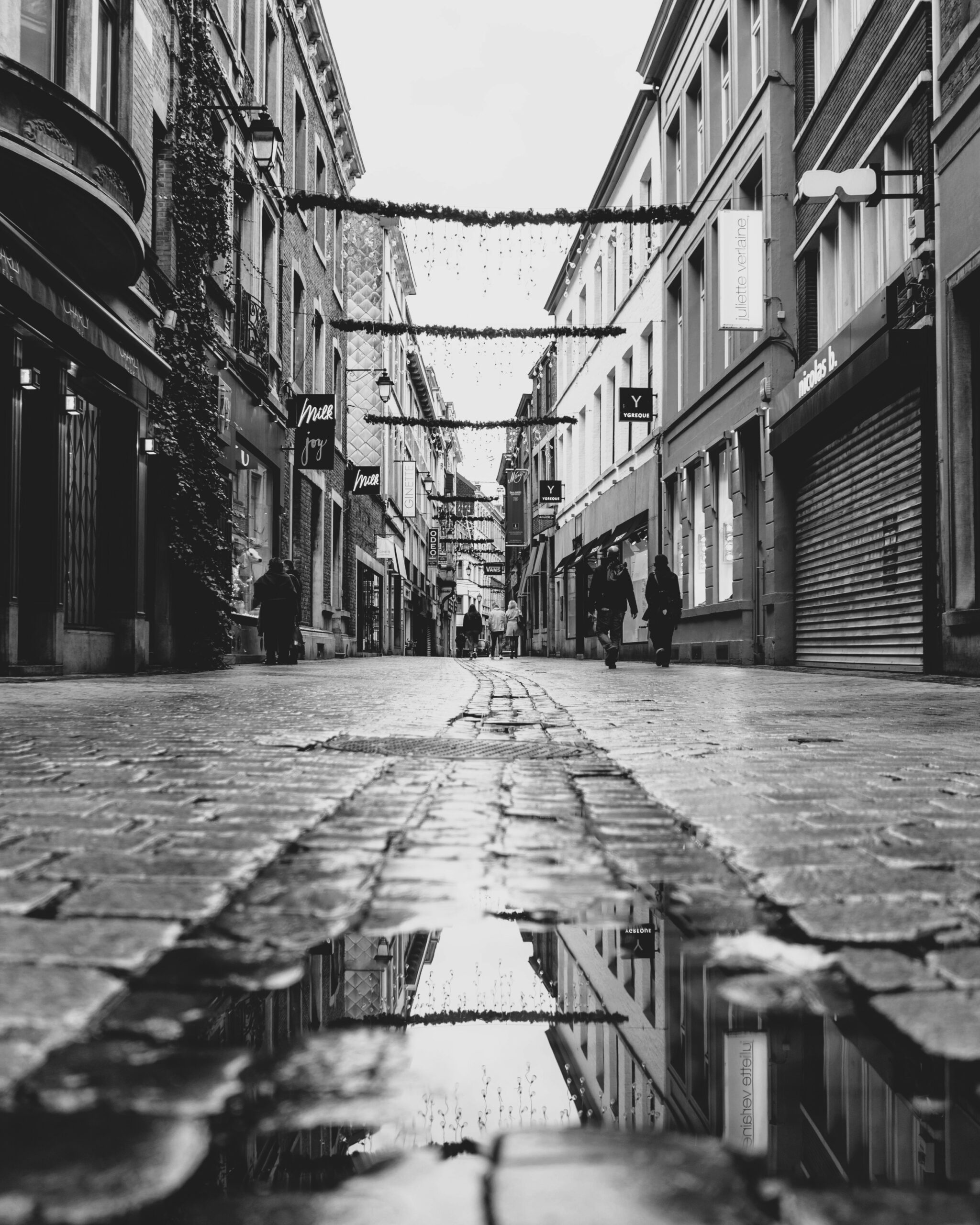 black and white photo of a street